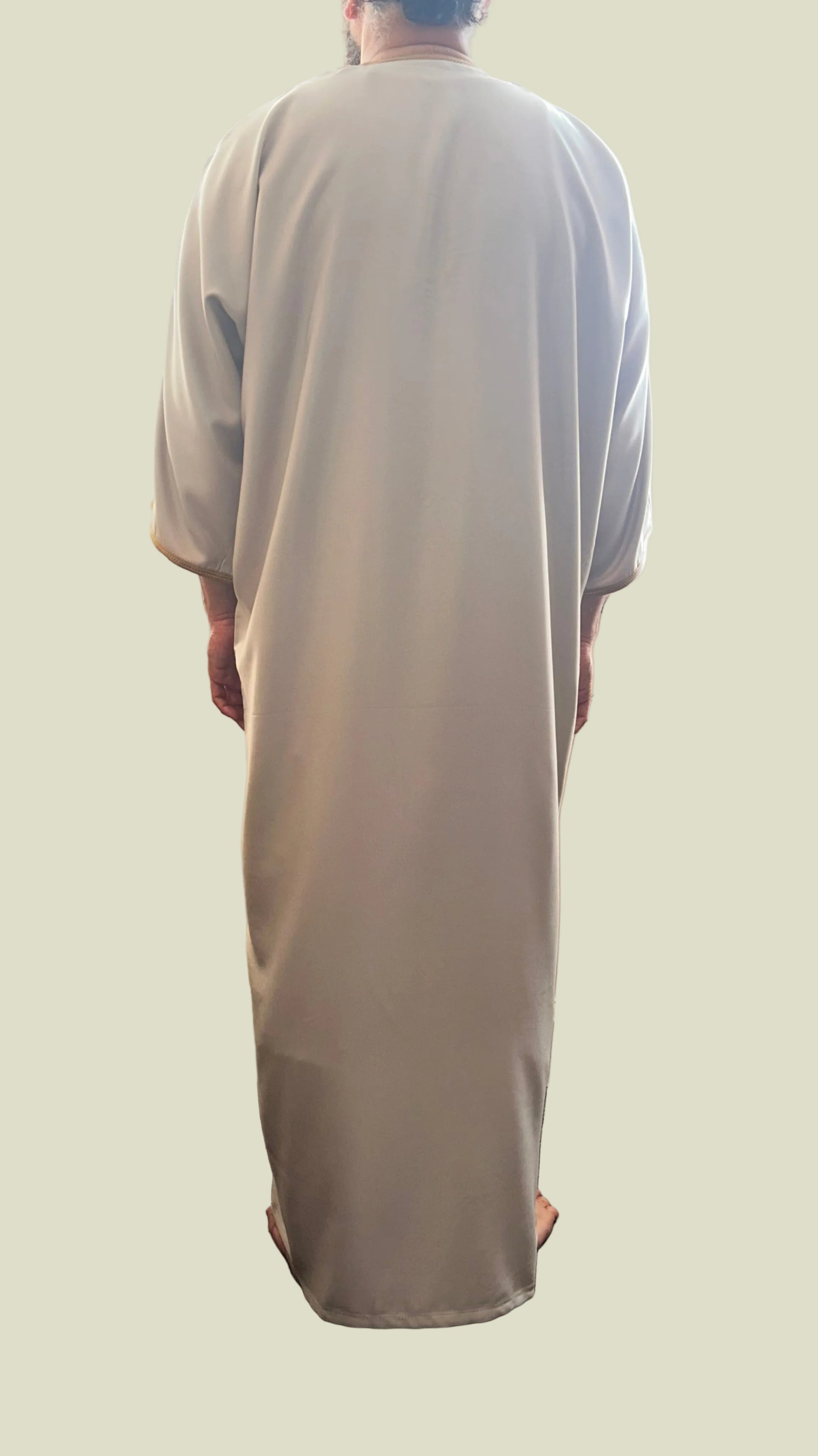Beige Moroccan thobe with copper embroidery – back view | Marwa London