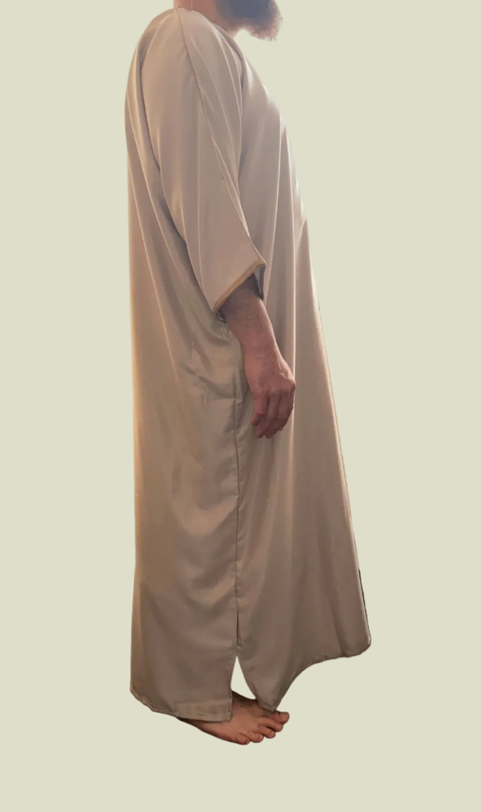 Beige Moroccan thobe with copper embroidery – side view | Marwa London