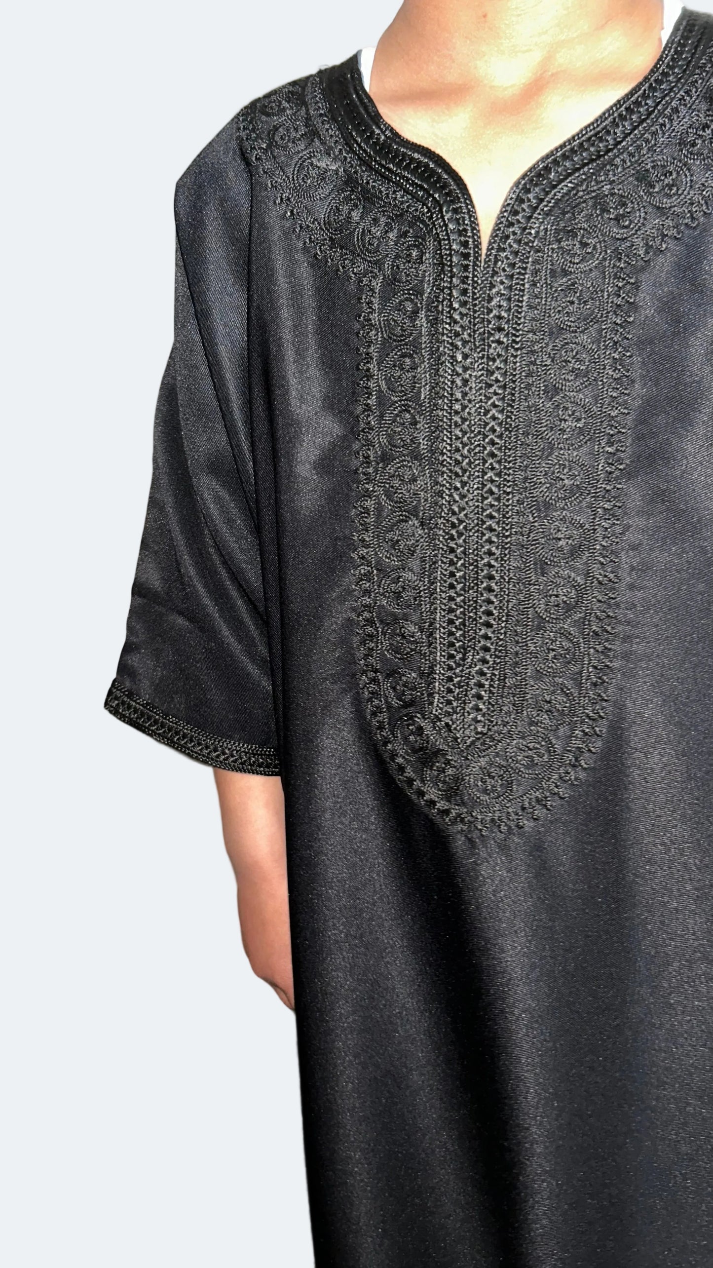 boys black Moroccan thobe with tonal black embroidery – closeup view | Marwa London